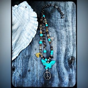 Turquoise bird double strand of dark wood & mixed bead Necklace.
